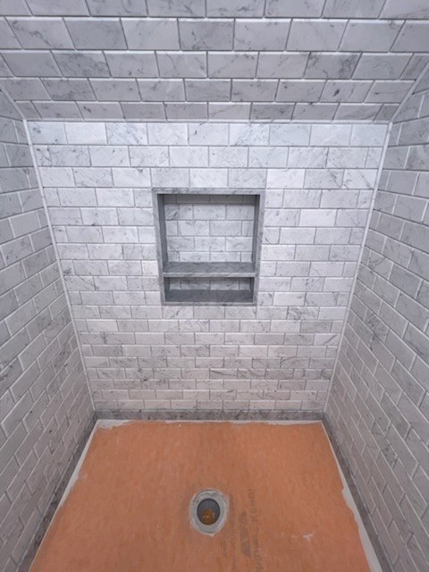 Carrara marble, set by hand